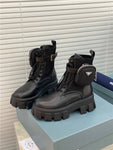 Bottes Prada de combat en cuir et nylon