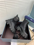 Bottes Prada de combat en cuir et nylon
