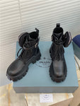 Bottes Prada de combat en cuir et nylon