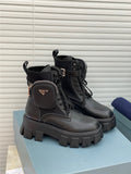 Bottes Prada de combat en cuir et nylon